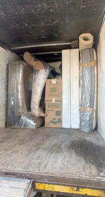 Furniture loaded up and packed tight nice and neat for safe travel.