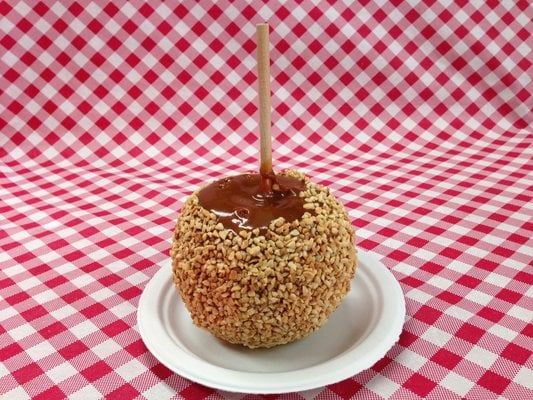 This honeycrisp caramel apple is sitting on a 6 inch plate. Gigantic and delicious!