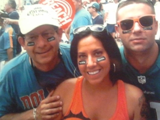 At a Dolphins game with my daughter and her boyfriend