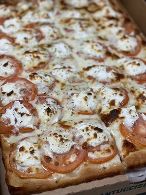 White pie with tomato and ricotta