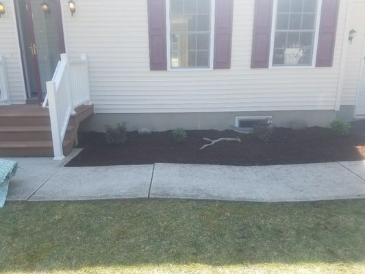 A simple mulch bed can turn your house from plain to WOW.