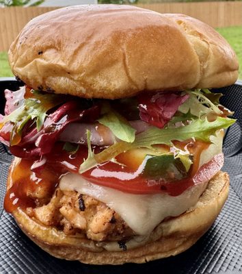 Salmon burger. Salmon patty meat on a brioche bun topped with your choice of available toppings.