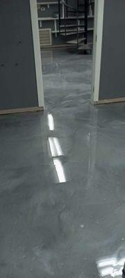 Metallic epoxy concrete coatings