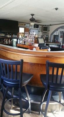 Oversized bar could be shrunk down to half it's size and have twice as many seating