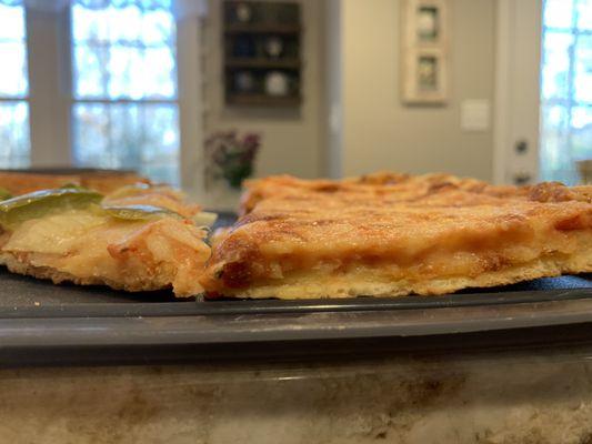 Green pepper/onion pizza (left) and "deep dish" Sicilian pizza (right)