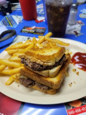 Huge patty melt and delicious French fries.