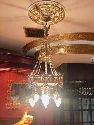 Installation of restored antique chandelier