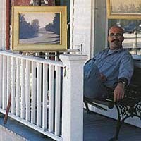 Gordon on the front porch of his gallery.