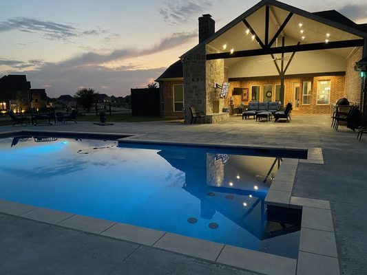 Patio addition, fireplace, and outdoor kitchen