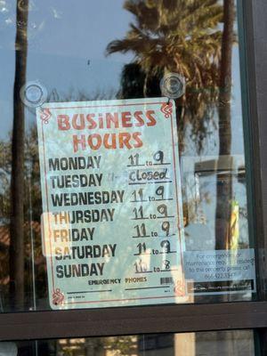 Business hours posted out front as of 1/2024