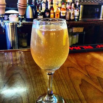 A surprise cocktail from the friendly blond curly haired bartender.  Refreshing glass of grapefruit effervescence.