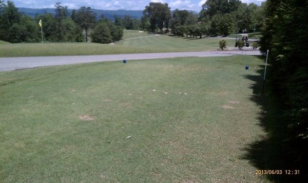 View of the par 4 12th fairway from back tee. It's across the road from the rest of the course. The par 3 11th green to left.