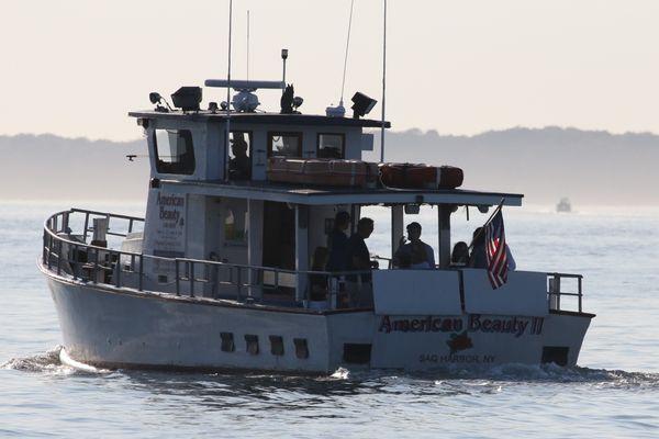 Private boat charter sunset cruise on American Beauty II