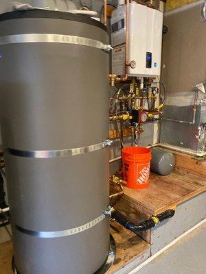 Replaced 4 old leaky hot water heater tanks with one hot water tank and boiler.