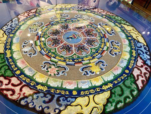 Exquisite Medicine Buddha sand mandala here on display right now.