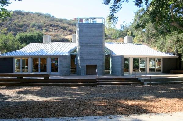 The exterior of our newly renovated dining hall, with a large patio and fireplace