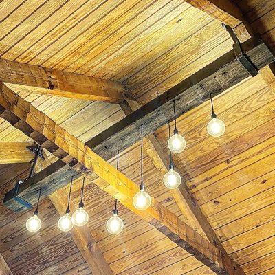 Reclaimed antique heart pine beam lighting.