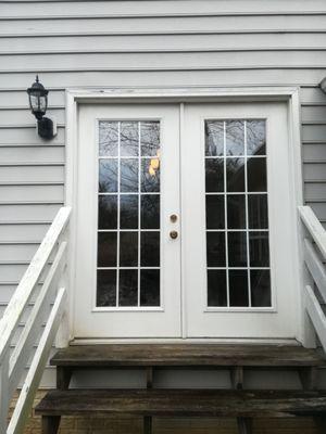 Insert glass (tempered) with grids installed in double door. =Ghaithsburg. MD