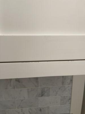 chipped paint on cabinet