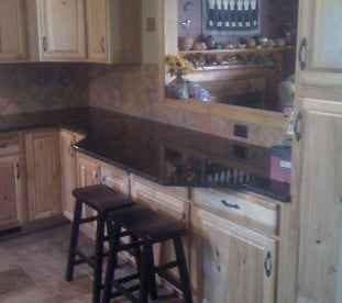 Another view of kitchen remodel. The window to the living room opened and brightened a dark space.