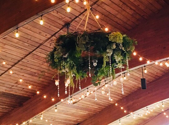 Custom designed and created- breathtaking grapevine wreath w/ fresh floral accents, greenery, hanging votives & crystal!