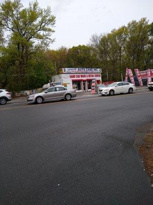 Open up more. Photo is front of shop. Clean cars/trucks in front. Shop is in the back. 2 guys personal service.