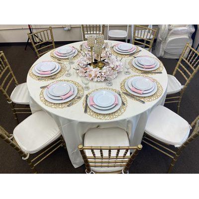 60" round table 
Gold Chiavari chairs with cushions
Table setting