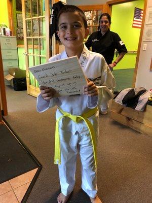 Master Yu signs Mason's 1st broad he broke to receive his yellow belt