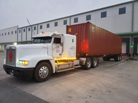 Ace truck unloading container near port of Savannah