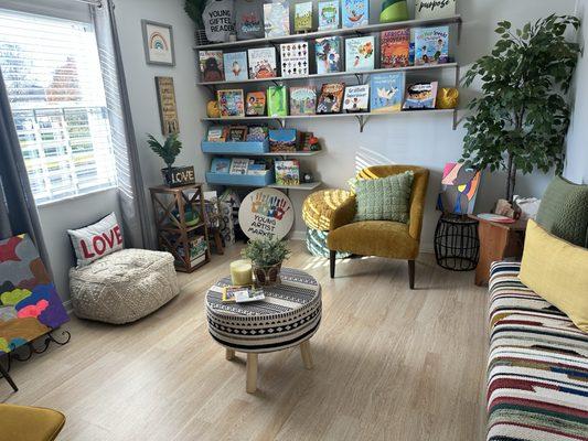 Children's book nook at Joyful Studio featuring diverse authors and stories for everyone!