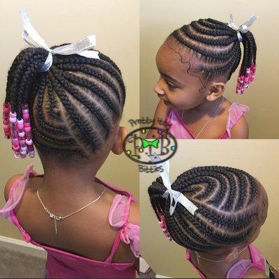 Braided ponytail with beads. Hair accessories included with every style.