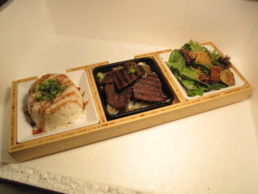 A custom bento box for a local Korean BBQ place made by one of our Resident Artists