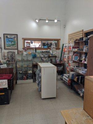 U-Haul supplies and office bits and bobs. We got it all. Right next to the crystal case!