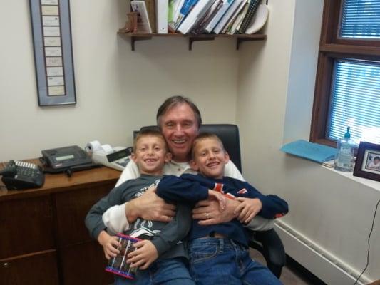 Just a happy man with a couple of his grandchildren.