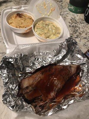 Beef brisket with macaroni and cheese and yummy potato salad.