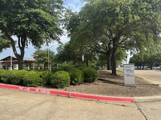 The drive thru is set back off of the main bank building.