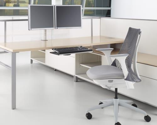 Herman Miller Canvas workstation with Sayl multi-purpose seat and ergonomic monitor arm.