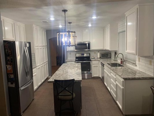 white cabinets, much brighter and looks so much better, very modern.