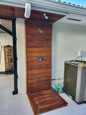 Outdoor wooden shower.