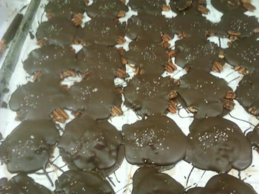 Dark Chocolate sandwiches fresh pecans and Sea Salted caramel. Yummy