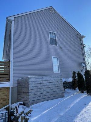 Before new siding replacement and gutter installation.