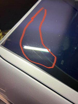 Cut marks in the glass from cutting the tint