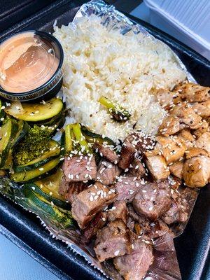 Steak & Chicken Combo with steamed rice, grilled vegetables with side of Yum Yum sauce