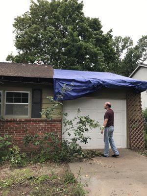 Tarp coming loose same day it was installed.