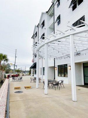 Patio area in front of the front door, Located right behind the Harrington Square sign