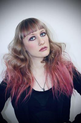 Square fringe with pink tipped out hair color