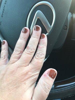 This is what my nails looked like when I left the salon. When I asked to speak to the manager she wouldn't come out of the back room.