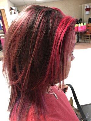 Highlights and added vibrant pink purple and blue .