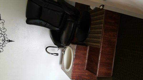 Our completely sanitary pedicure station with message chair.