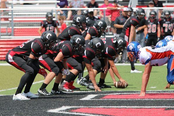 The Covenant O-line prepares to give a record breaking number of concussions to the opposing team